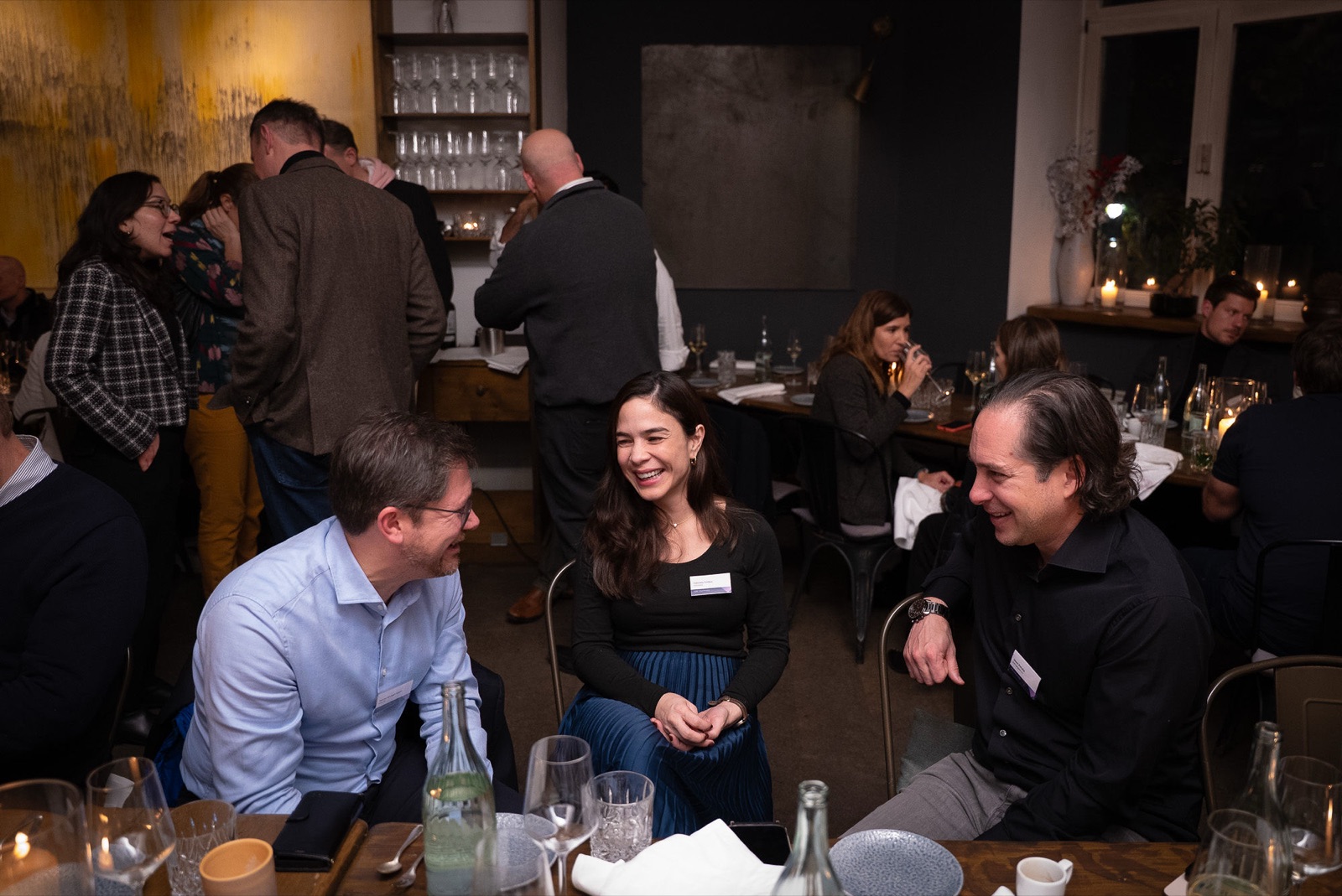 Participants in conversation at the leadership dinner