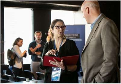 Two participants in conversation between sessions