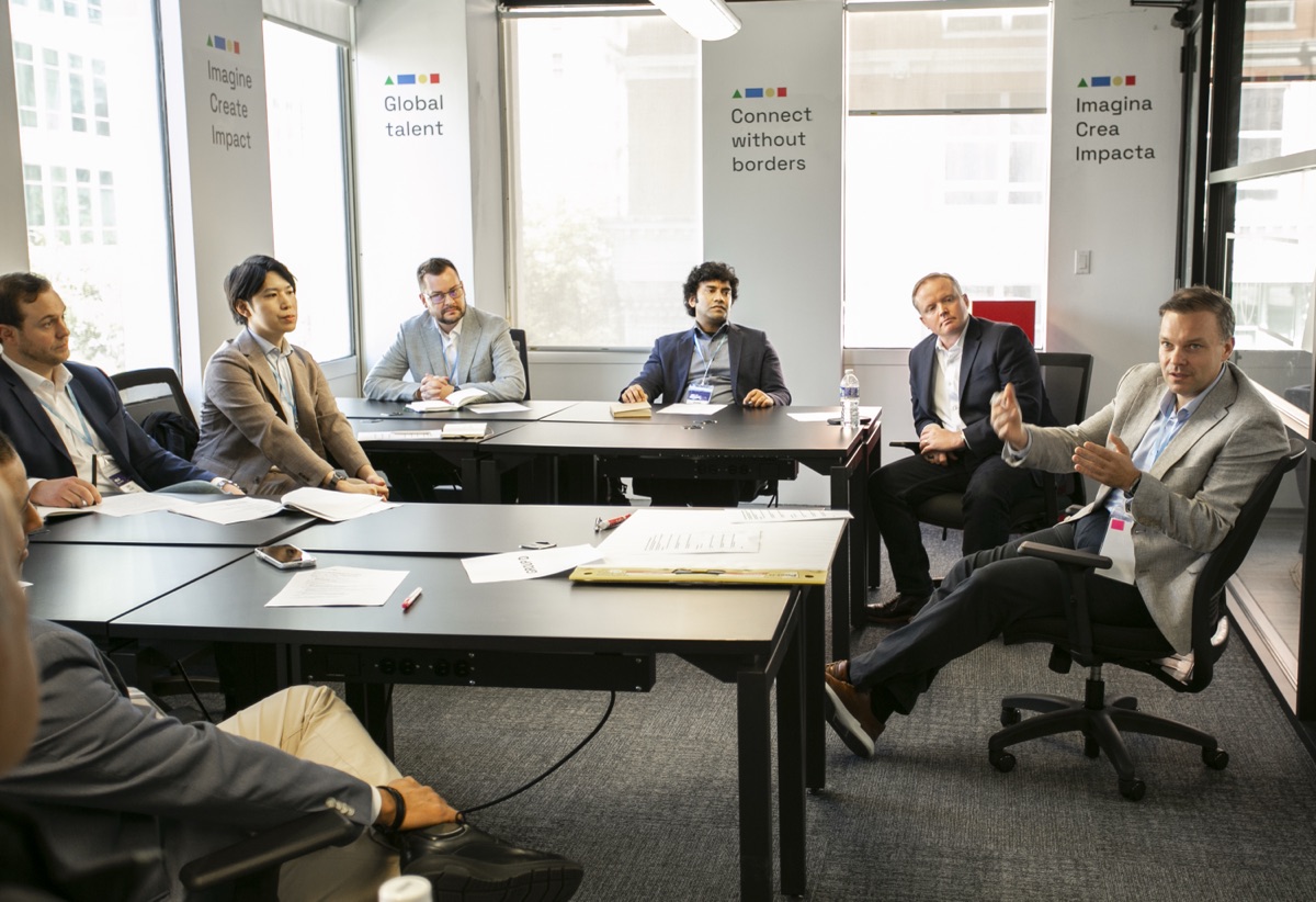 A small-group roundtable at the 2026 summit